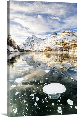 Methane Bubbles In Icy Surface Of Silsersee, Engadine Valley, Swiss Alps, Switzerland