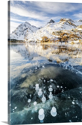 Methane Bubbles In Icy Surface Of Silsersee, Engadine Valley, Swiss Alps, Switzerland