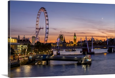 Millenium Wheel with Big Ben on the skyline beyond at sunset, London, England