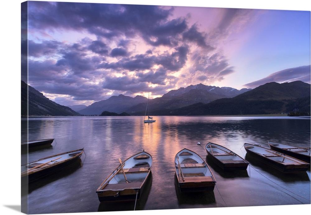Moored boats in Lake of Sils at sunrise, Maloja Pass, Engadine valley, Graubunden, Switzerland, Europe