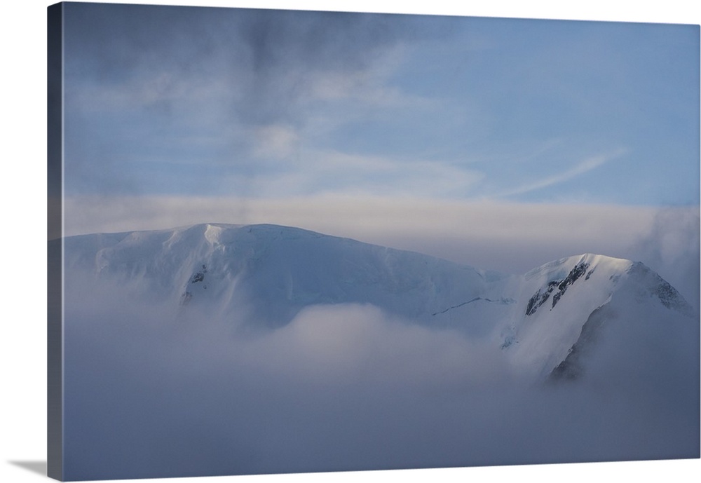 Mountain breaking through the clouds, Elephant Island, South Shetland Islands, Antarctica, Polar Regions