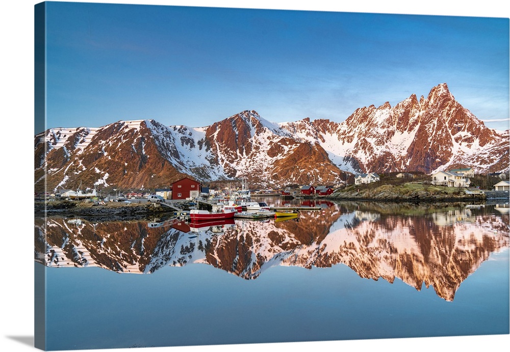 Mountains reflected in the cold sea at sunrise, Ballstad, Vestvagoy, Lofoten Islands, Norway, Scandinavia, Europe