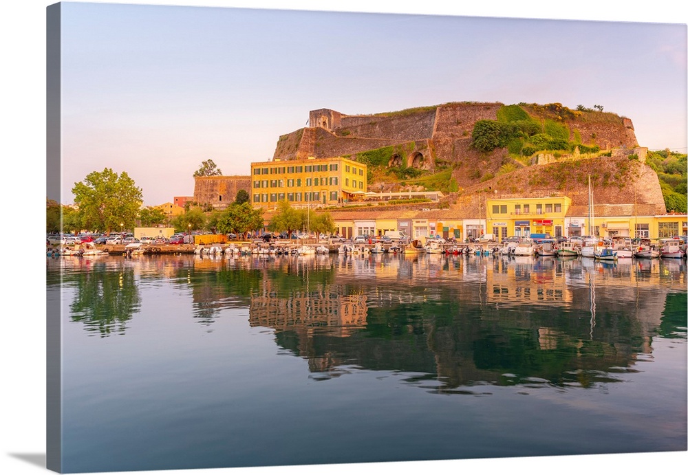 View of the New Fortress overlooking the Old Port Marina at sunset, Corfu, Ionian Sea, Greek Islands, Greece, Europe