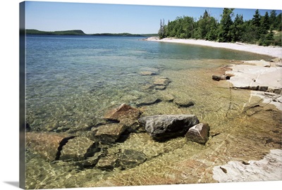 North shore of lake on rocky platform, Lake Superior, Canada