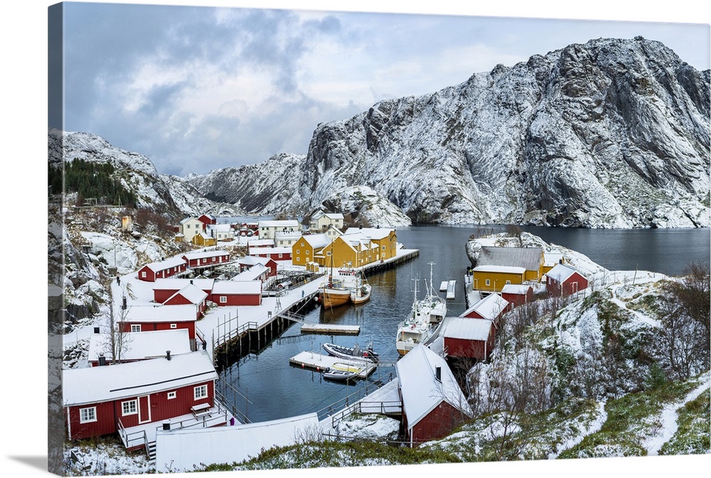 Panoramic of the fishing village of Nusfjord and harbor covered with snow in winter, Nordland, Lofoten Islands, Norway, Sc...