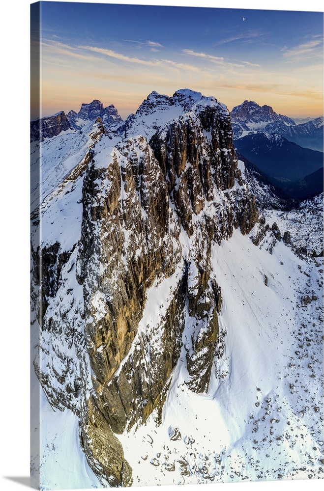 Aerial panoramic of majestic Nuvolau, Monte Pelmo and Civetta covered with snow at sunset, Dolomites, Veneto, Italy, Europe