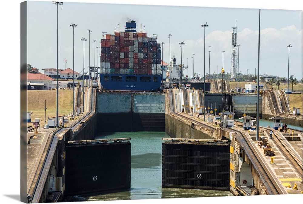 Panamax-sized container ship goiing up through Gatun Locks on Panama Canal, Panama, Central America