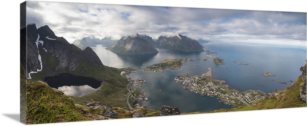 Panorama of the blue lake and sea framed by rocky peaks, Reinebringen, Moskenesoya, Lofoten Islands, Norway, Scandinavia, ...