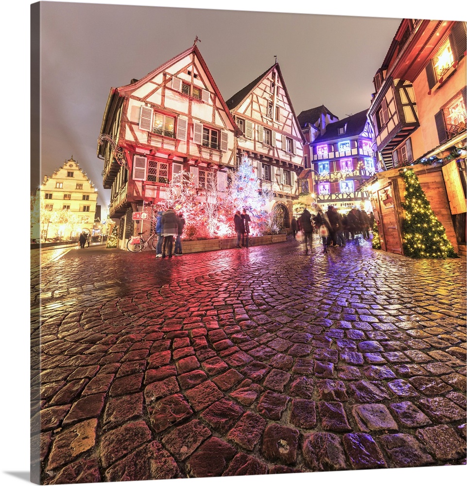 Panorama of typical houses enriched by Christmas ornaments and lights at dusk, Colmar, Haut-Rhin department, Alsace, Franc...