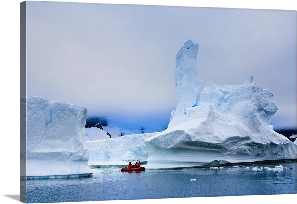 Passengers exploring icebergs, Antarctica, Polar Regions
