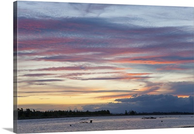 Pink clouds over the Wairau River estuary at dusk, New Zealand