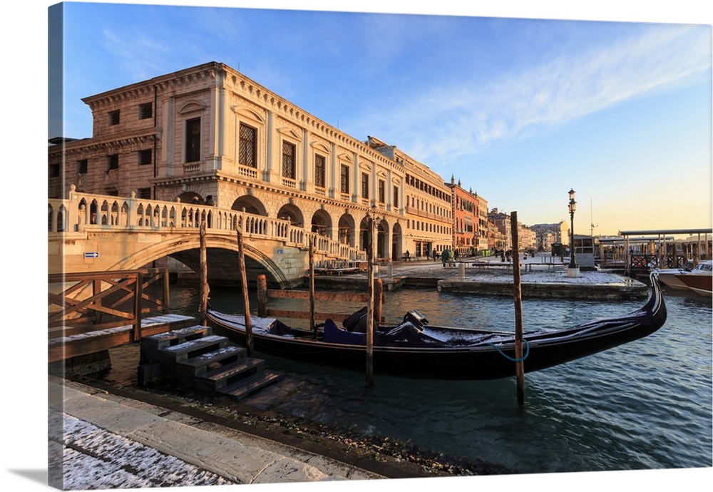 Gondola, Ponte Della Paglia and Riva Degli Schiavoni at sunrise after snow, Venice, Veneto, Italy