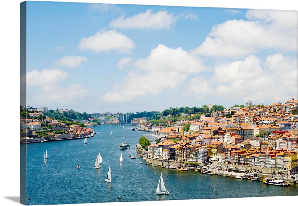 A view of Porto's historic centre and the Duoro River flowing towards its estuary and the Atlantic Ocean, Porto, Norte, Po...