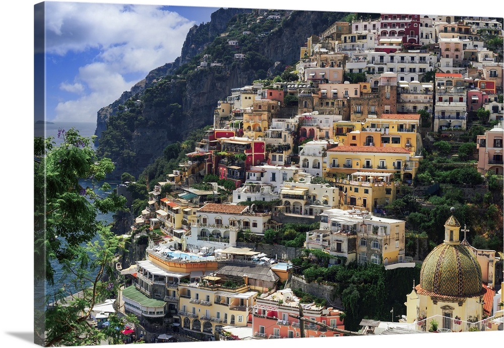 Positano town hill view with low rise colorful buildings above the sea line, Positano, Amalfi Coast, UNESCO World Heritage...