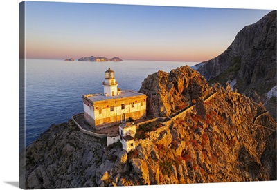 Punta Della Guardia Lighthouse On Top Of A Cliff On The Island Of Ponza, Italy