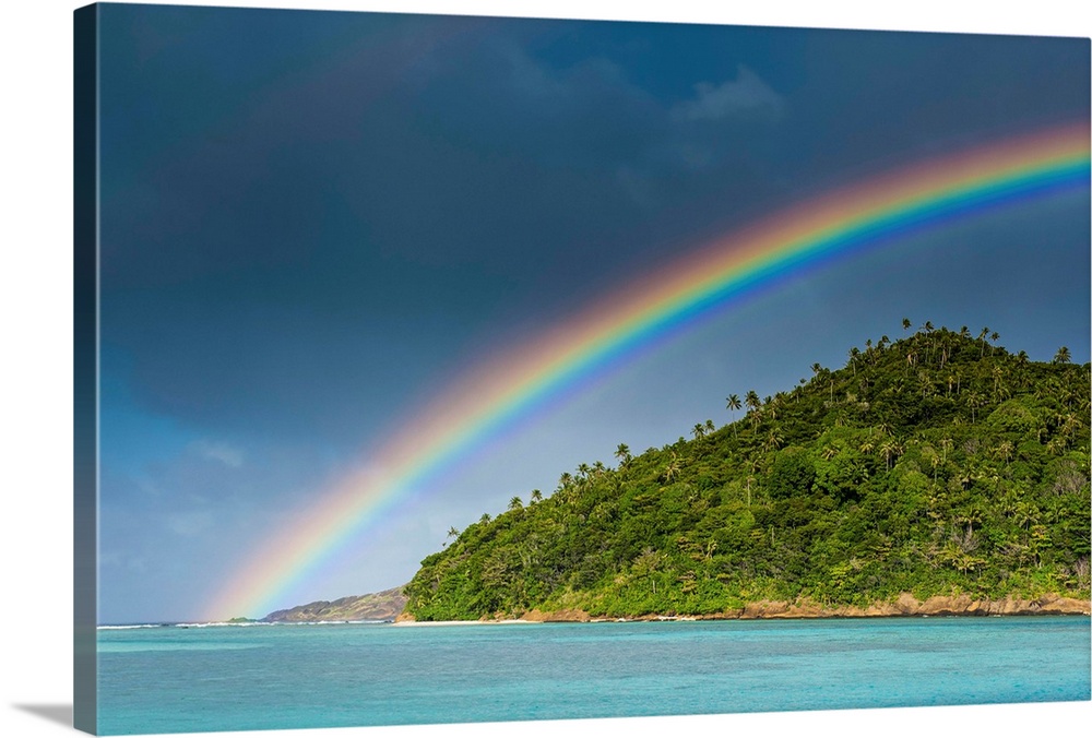 Rainbow over an islet off Ofu Island, Manua Island group, American Samoa