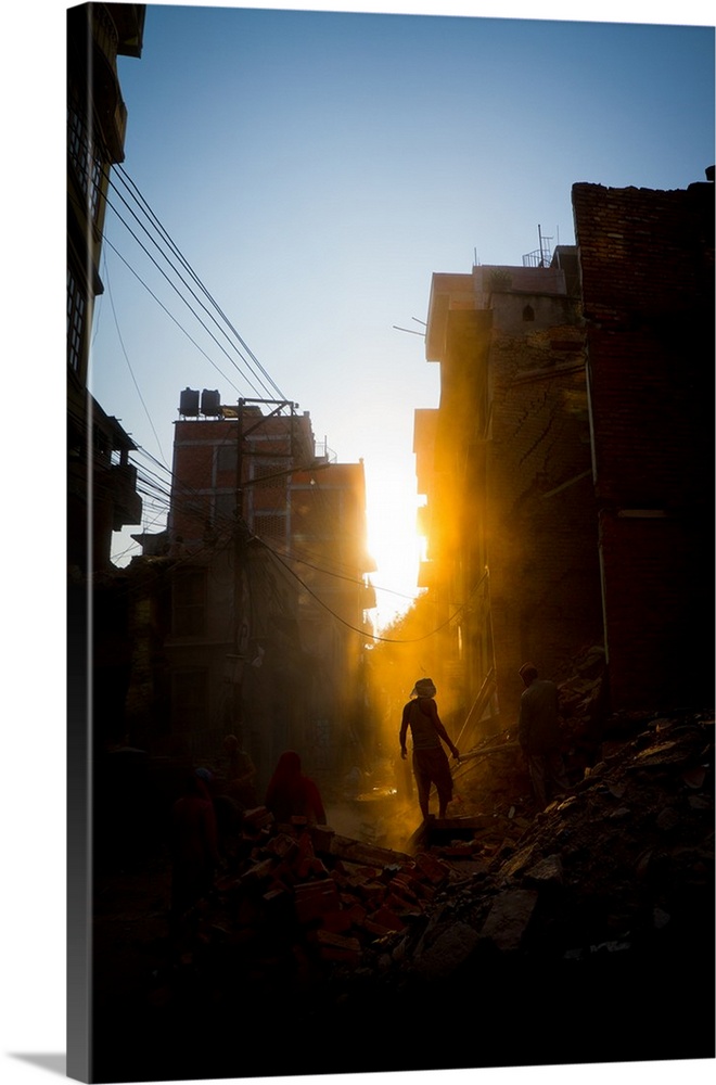 Rays of early evening sun on the dusty streets of Thamel after earthquake, Kathmandu, Nepal