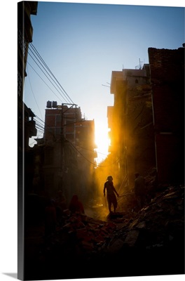 Rays of early evening sun on the dusty streets of Thamel after earthquake, Nepal