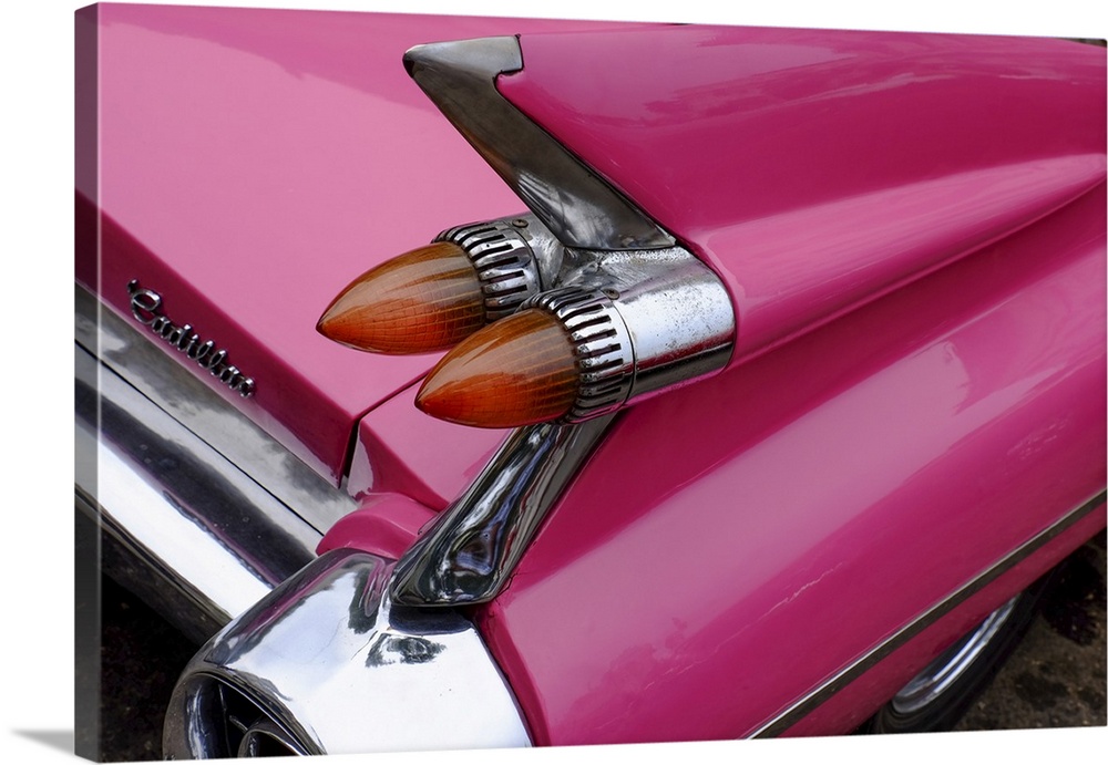 Rear fin and lights of vintage pink Cadillac, Havana, Cuba, West Indies, Central America