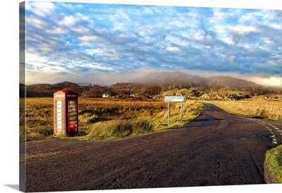 Red telephone box at side of road in Ardnamurchan moors, Scottish Highlands, Scotland