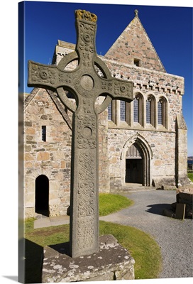 Replica of St. John's cross stands proudly in front of Iona Abbey, Scotland