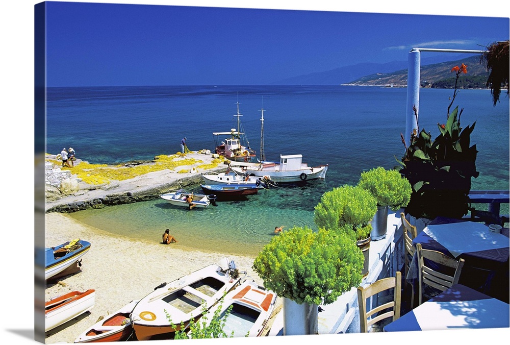 Restaurant overlooking fisherman's bay, Ikaria, Greece, Europe