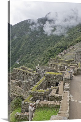 Restoration work at the Inca ruins of Machu Picchu, Peru