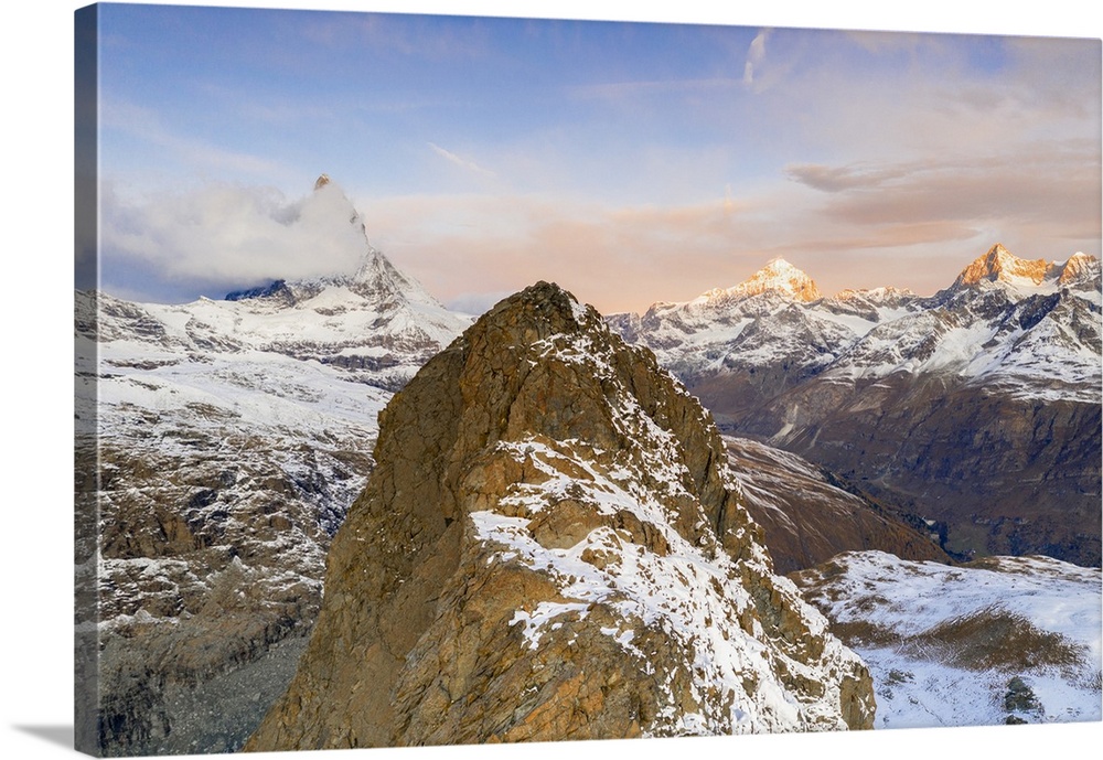 Aerial view of Riffelhorn ridge, Matterhorn and Dent Blanche at sunrise, Zermatt, canton of Valais, Swiss Alps, Switzerlan...