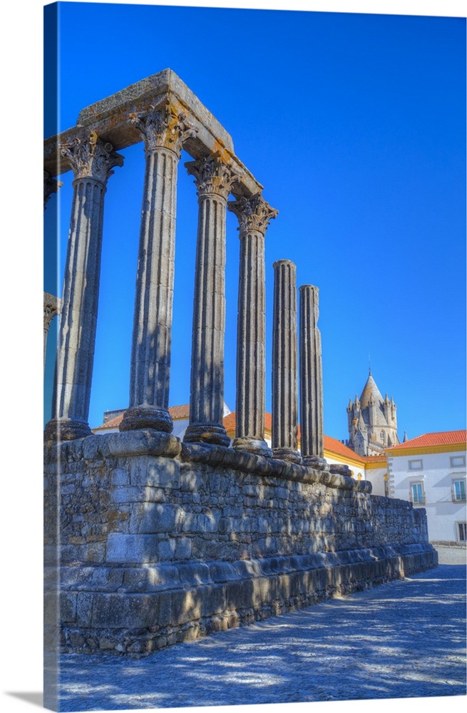 Roman Temple in foreground, Evora Cathdral in the background, Evora, UNESCO World Heritage Site, Portugal, Europe