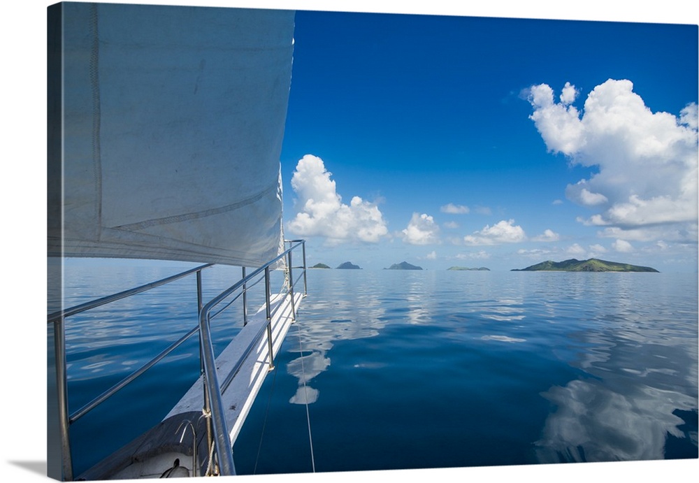 Sailing in the very flat waters of the Mamanuca Islands, Fiji, South Pacific