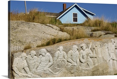 Sculpture of residents carved onto rock, at Peggys Cove, Nova Scotia, Canada