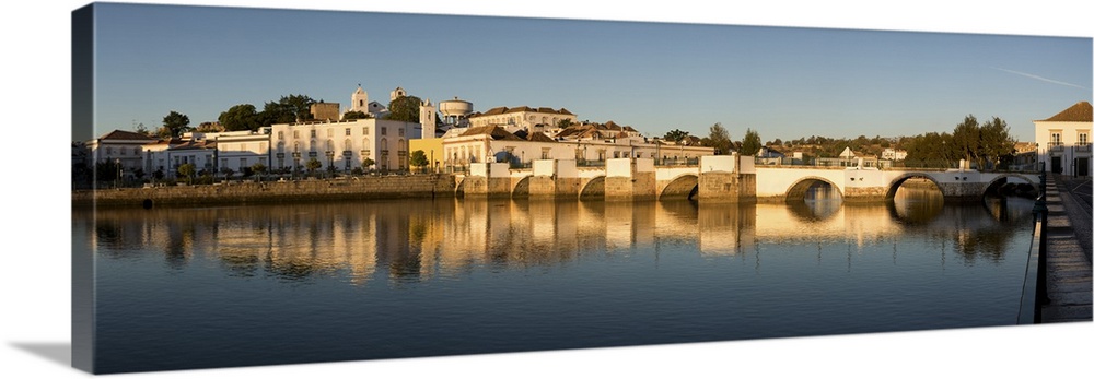 Seven arched Roman bridge and town on the Rio Gilao river, Tavira, Algarve, Portugal