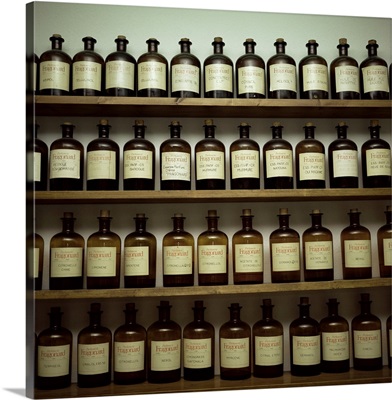Shelves of old essence bottles, Parfumerie Fragonard, Grasse, Provence, France
