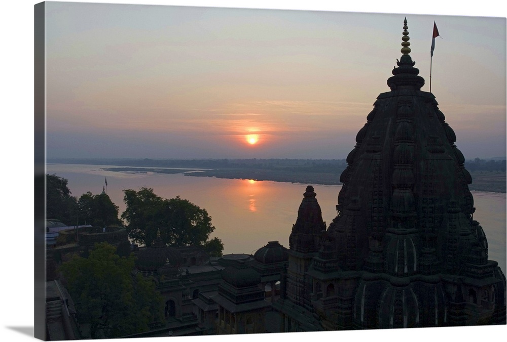 Shiva Temple with the Narmada river in background, Maheshwar, India