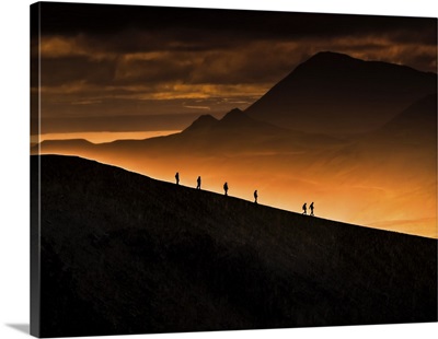 Six mountaineers trek on Krafla Volcano's brim, Iceland