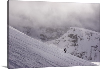 Skier in the mountains on a magical looking day, Canada