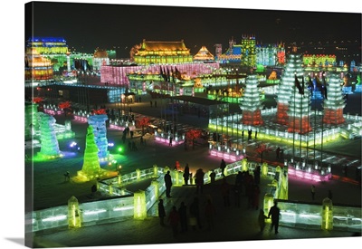 Snow and ice sculptures illuminated at night at the Ice Lantern Festival, Harbin, China