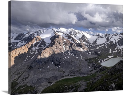 Snow-Capped Peaks And Lush Valleys At Sunset, Kyrgyzstan