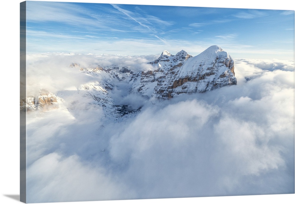 Aerial view of the snow capped Tofane group in a sea of clouds, Dolomites, Belluno province, Veneto, Italy, Europe