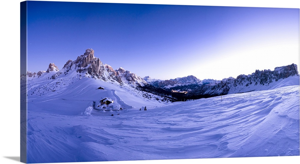 Pano of snowy Ra Gusela, Cortina d'Ampezzo, Monte Cristallo and Lastoi De Formin at dusk, Giau Pass, Dolomites, Veneto, It...