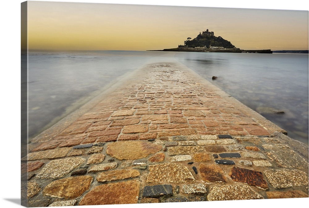 St. Michael's Mount in early morning light and a falling tide, with the causeway between the island and the mainland at Ma...