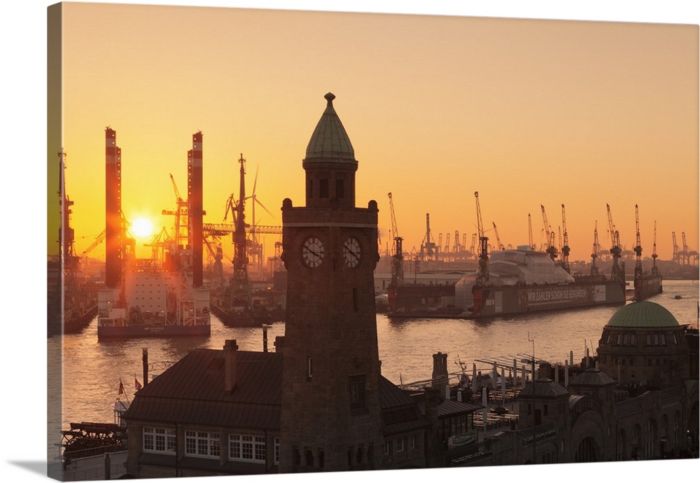 St. Pauli Landungsbruecken pier against harbour at sunset, Hamburg, Hanseatic City, Germany