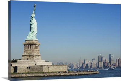 Statue of Liberty, Liberty Island and Manhattan skyline beyond, New York City, New York