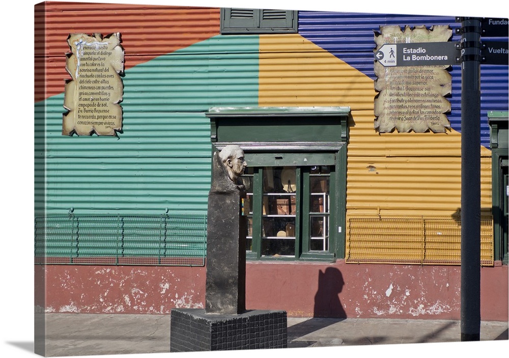 Statue of famous local painter Quinquela Martin at Caminito alley in the Boca, old Italian quarter of Buenos Aires, Argentina