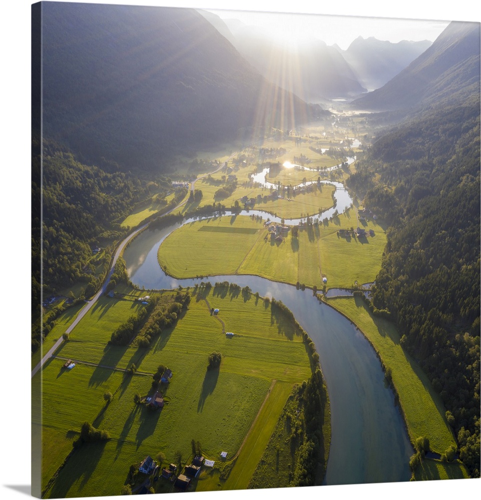 Aerial panoramic of Stryneelva river and fields during a misty sunrise, Stryn, Nordfjorden, Sogn og Fjordane county, Norwa...