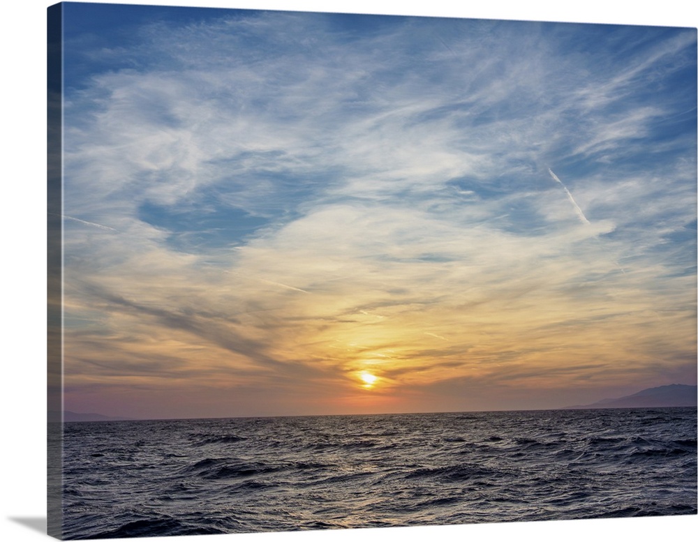 Sunset near the coast of Mykonos Island, Cyclades, Greek Islands, Greece, Europe