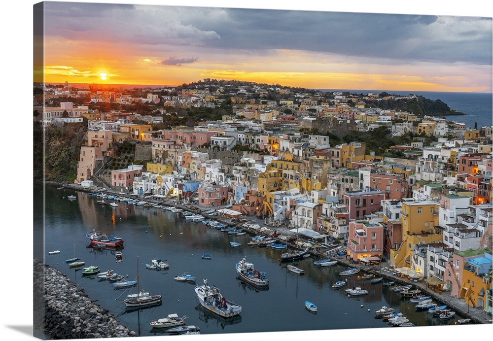 Sunset on Marina Corricella, the famous colourful fishing village on Procida island, Tyrrhenian Sea, Naples district, Napl...