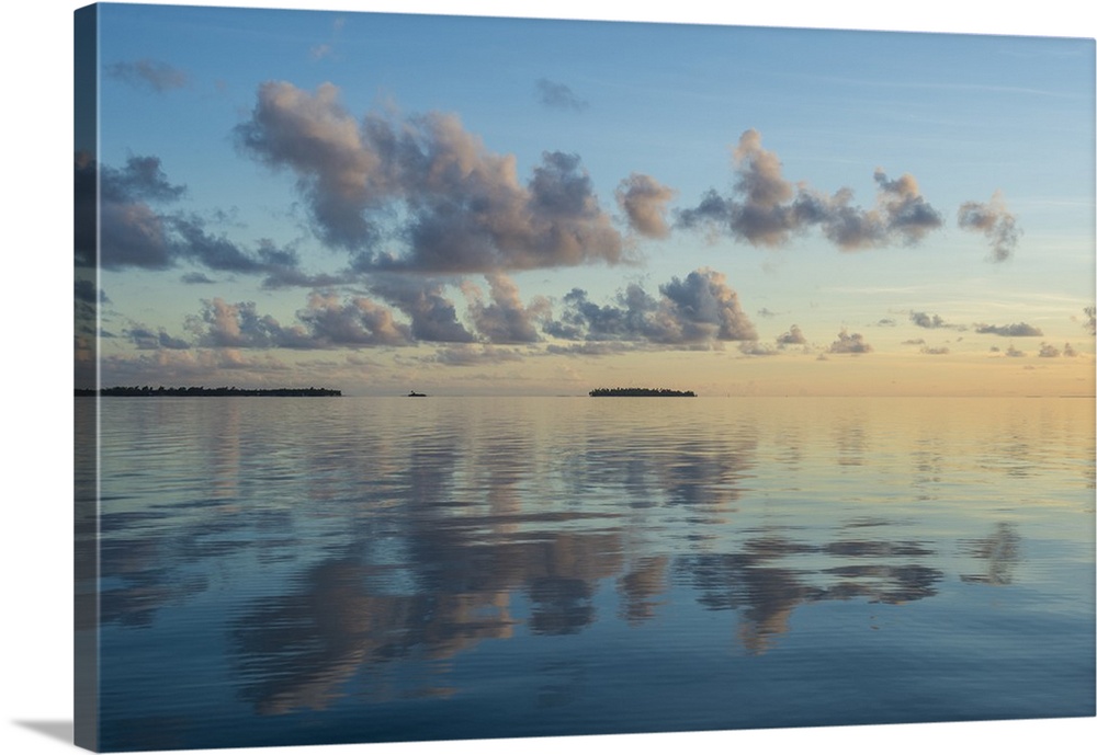 Sunset over the calm waters of Tikehau, Tuamotus, French Polynesia