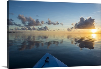 Sunset over the calm waters of Tikehau, Tuamotus, French Polynesia