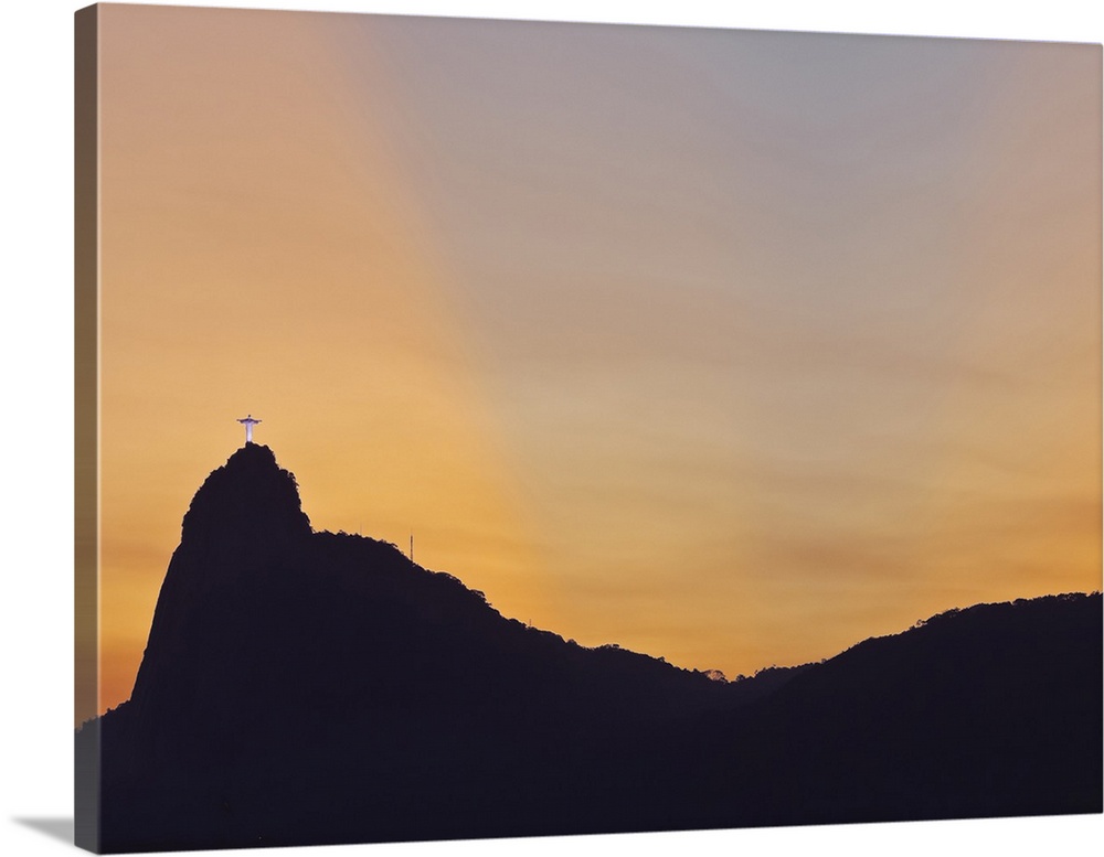 Sunset view of Christ the Redeemer statue and Corcovado Mountain, Rio de Janeiro, Brazil, South America